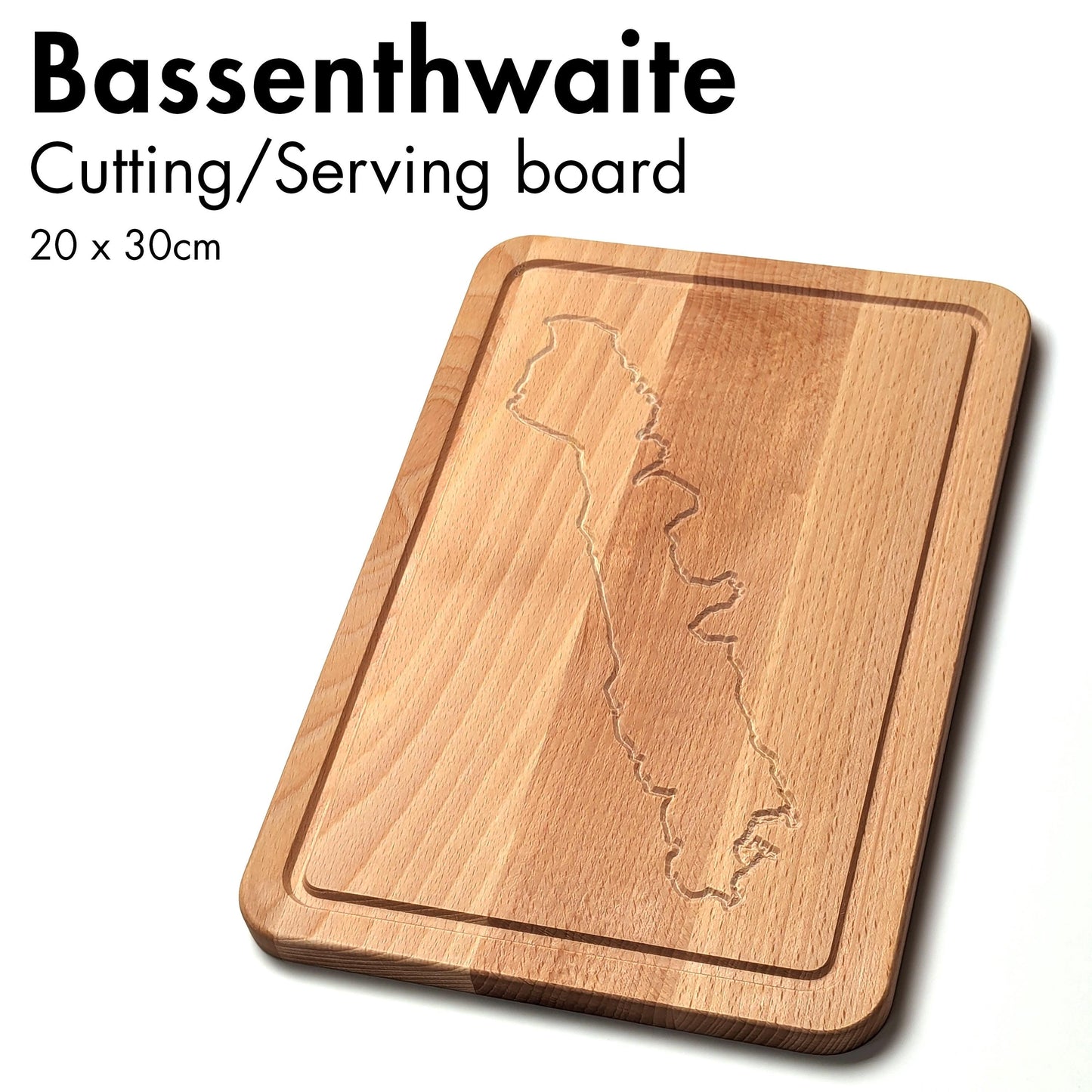 Cutting board engraved with the outline of Bassenthwaite. The text on the image says Cutting/Serving board, 20x30 cm.