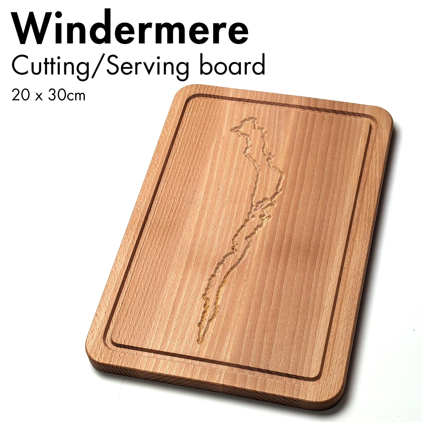 Cutting board engraved with the outline of Windermere. The text on the image says Cutting/Serving board, 20x30 cm.